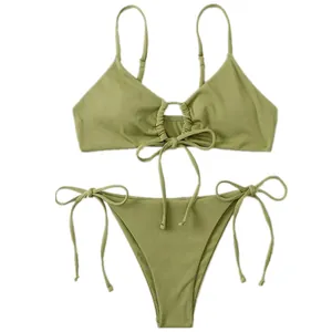 Detailed view of olive green ribbed bikini set with front tie and side-tie bottoms