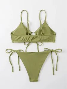 Detailed view of an olive green ribbed triangle bikini set with tie-side bottoms