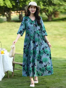 Elegant green floral cotton silk midi dress with half sleeves for summer beach style