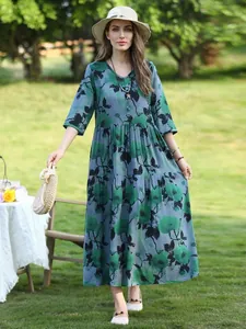 Elegant green floral cotton silk midi dress with half sleeves for summer beach style