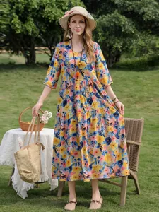 Elegant summer floral print cotton silk dress with 3/4 sleeves and a V-neckline