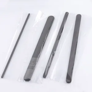 Detailed view of polished black stainless steel strips for DIY bangle jewelry making