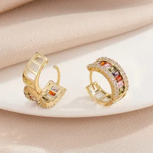 Elegant gold plated copper hoop earrings with colorful rainbow baguette zircons