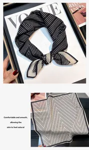 Elegant black and white striped silk square scarf with unique geometric pattern detail