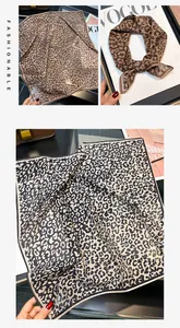 Detail view of lightweight leopard print silk-cotton square scarf with breathable texture