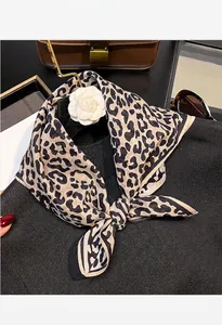 Detail of leopard print silk cotton blend square scarf for women's fashion style