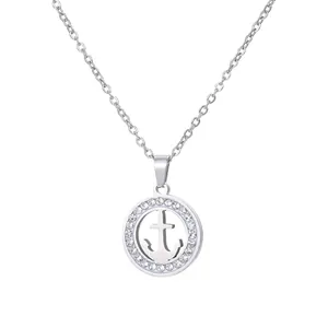 Macro view of silver titanium steel anchor pendant with clear rhinestones