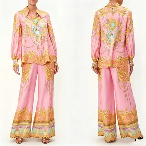 Front and back view of pink baroque print shirt and wide-leg trousers set
