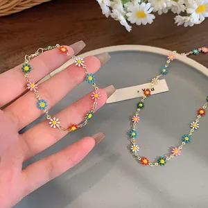 Colorful enamel daisy flower necklace and bracelet set in sweet dopamine style.