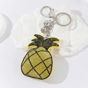 Sparkling rhinestone pineapple keychain with leather base and silver clasp bag charm
