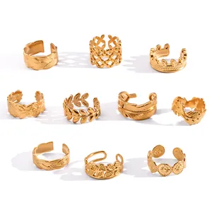 Vintage gold stainless steel adjustable open rings set with leaf and feather designs