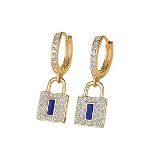 Hip-hop style gold lock hoop earrings with sparkling paved zirconia and blue gemstone