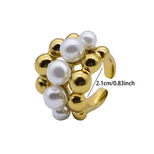 Elegant gold stainless steel open ring featuring white pearls and a 2.1cm diameter