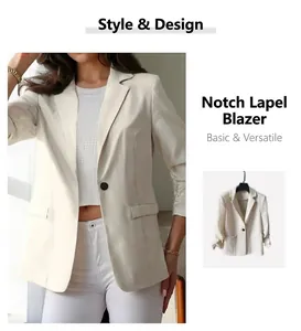 Close-up of a women's cream slim fit blazer featuring ruched sleeves and a lapel.