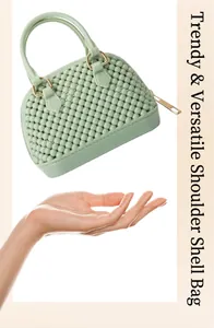 Mint green mini PVC jelly shell handbag with beaded texture displayed above a hand