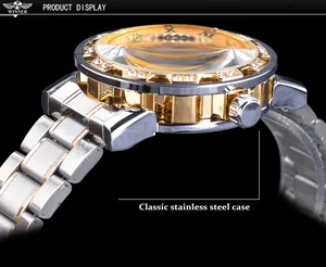 Detailed macro view of gold-silver stainless steel watch case with sparkling rhinestones