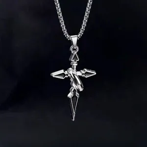 Detail of gothic silver-toned sword cross necklace with black enamel center inlay