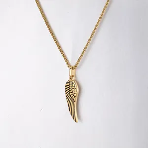 Gold stainless steel angel wing pendant necklace showing intricate feather detail