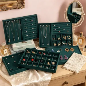 Dark green velvet jewelry display trays for rings, necklaces and earrings set