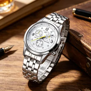 Close-up of elegant stainless steel chronograph watch with white dial and yellow hands