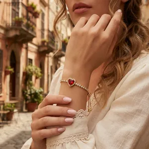 Elegant copper heart bracelet with red crystal stones and adjustable gold chain for women