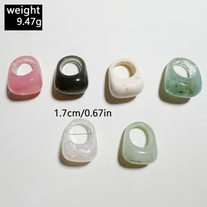 Minimalist chunky acrylic rings in multiple colors showing 1.7cm inner diameter and weight