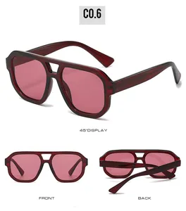 Detailed view of burgundy pilot sunglasses with double bridge and vibrant red lenses