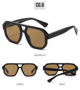 Detail views of black double bridge pilot sunglasses with brown lenses