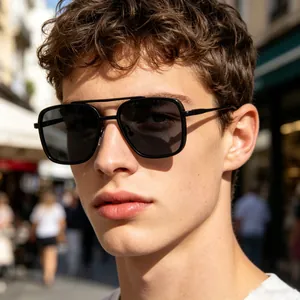 A close-up detail of men's vintage square sunglasses featuring a black frame and double bridge.