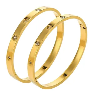 Bracelets en acier titane doré avec étoile à huit branches et pierres brillantes de luxe