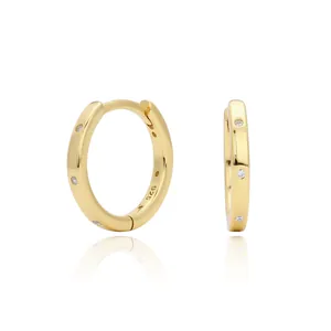 Detailed view of gold-plated S925 silver hoop earrings with cubic zirconia stones