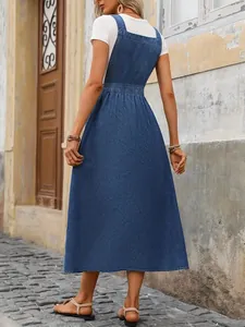 Womens casual blue denim pinafore dress with stylish a-line skirt and waist detailing