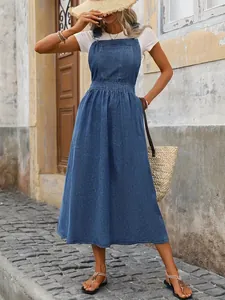 Casual blue denim pinafore dress with front pocket and adjustable straps for women