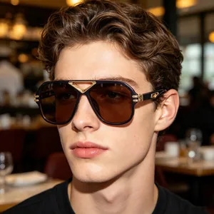 Professional close-up of men's retro steampunk sunglasses with stylish gold metal accents