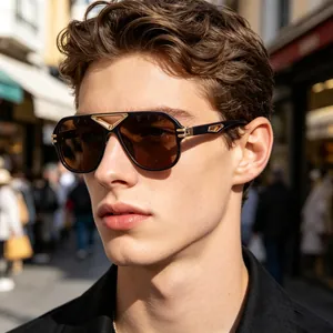 Close-up of retro steampunk sunglasses for men with gold V-shaped metal accents