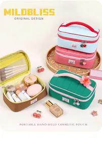 Stylish macaron quilted makeup organizer bag with multiple compartments for travel and storage