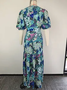 Back view of elegant floral print maxi dress with puff sleeves and slim fit design