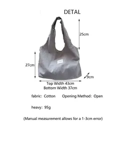 Detailed dimensions and material specifications for a large grey cotton tote bag