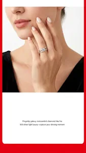 Close-up of moissanite S925 silver ring worn on model's hand showing elegant sparkle.