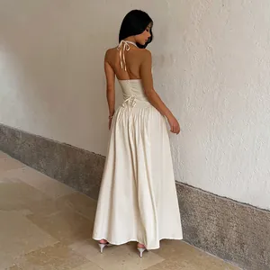 Robe longue dos nu élégante crème avec licou et taille cintrée pour femmes chic