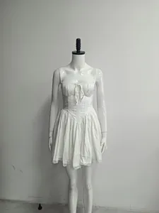 White lace patchwork mini strap dress on mannequin with square neck and A-line silhouette