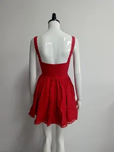 Back view of a red short strap dress with lace trim and sexy backless design
