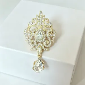 Vintage luxury crystal water drop brooch with elegant gold alloy and diamond inlay