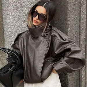 Vintage oversized brown leather jacket with litchi grain texture for a chic look