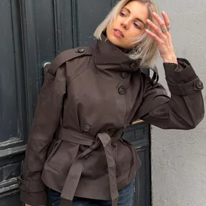 Stylish women's short double-breasted trench coat with waist belt for autumn wear