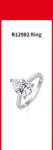 Close-up of a pear-shaped moissanite stone set on a minimalist 925 silver band