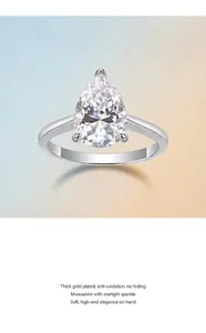 Detailed view of elegant pear-shaped Moissanite ring in 925 silver with starlight sparkle.