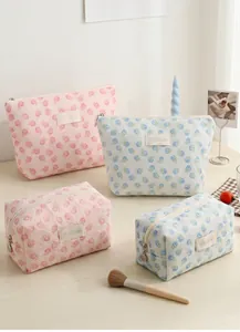 Set of fresh floral mesh jacquard cosmetic bags in pink and blue pastel tones for storage