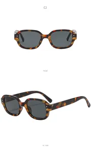 Detailed front and 45-degree side views of stylish tortoise shell oval frame sunglasses.