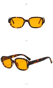 Detailed front and 45-degree side views of tortoiseshell oval sunglasses with orange lenses